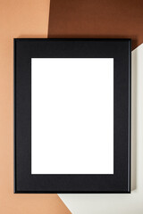 Mock up poster. Minimal template with empty picture frame mock up. Brown background