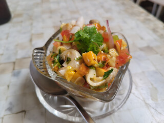 A type of vinaigrette with cashew, tomato and crustaceans - typical Brazilian food