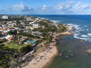 Fototapeta premium Beautiful Itapuã beach with clear blue water in urban coastal setting in Salvador, Bahia, Brazil