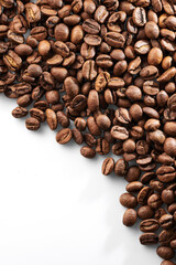 Roasted coffee beans isolated close up on white background, clipping path