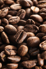 Roasted coffee beans macro close up background