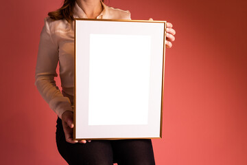 Mock up poster. Minimal template with empty picture frame mock up. Girl holding frame