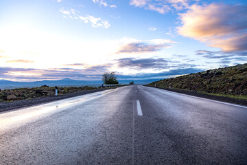 The road curves beautifully in the evening.
