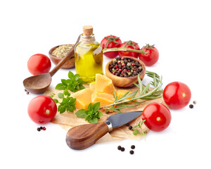 Fresh tomatoes with basil leaves, rosemary,  pepper, olive oil and cheese  isolated on white background. Ripe tomatoes with spices.