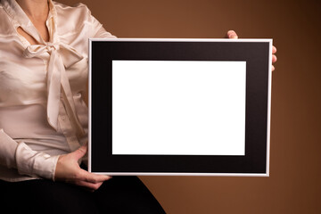 Mock up poster. Minimal template with empty picture frame mock up. Girl holding frame