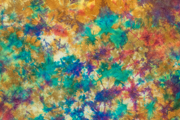 tie dye pattern hand dyed on cotton fabric abstract texture background.