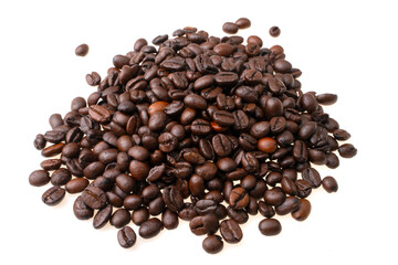 heap of coffee beans on a white background.  soft focus.shallow focus effect.