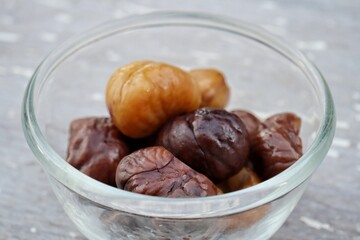 Chestnut on old white wood background