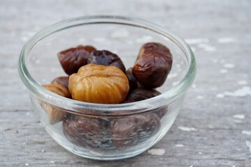 Chestnut on old white wood background
