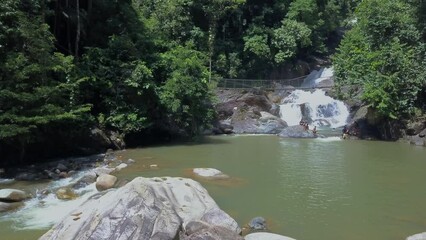 Kenyir, Malaysia - July 23, 2020 aerial view of Lasir waterfall or Air terjun Lasir, tourist attraction in Terengganu.