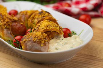 Crispy rolls with spicy sausage