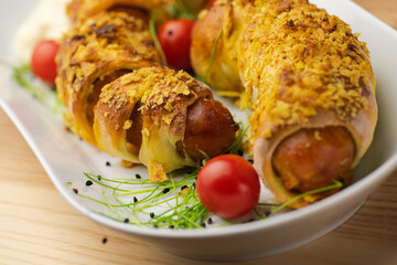 Crispy rolls with spicy sausage