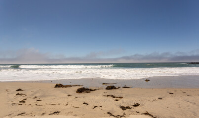 A view on Pacific ocean, cast, rocks and waves