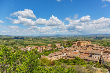 Fototapeta na wymiar Aerial view of a landscape in Tuscany with the city of San Gimignano in Italy