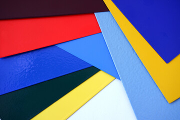 Powder Coatings sample plate. Colorfully painted metal plates on a white background