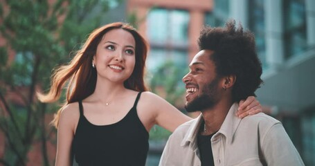 A couple talking and trying vr reality in the city - Powered by Adobe