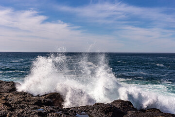 A view on Pacific ocean, cast, rocks and waves