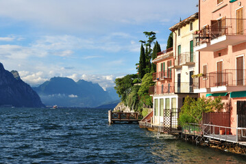View of Lake Garda and Mountains from Malcesine with Lake Side Buildings 