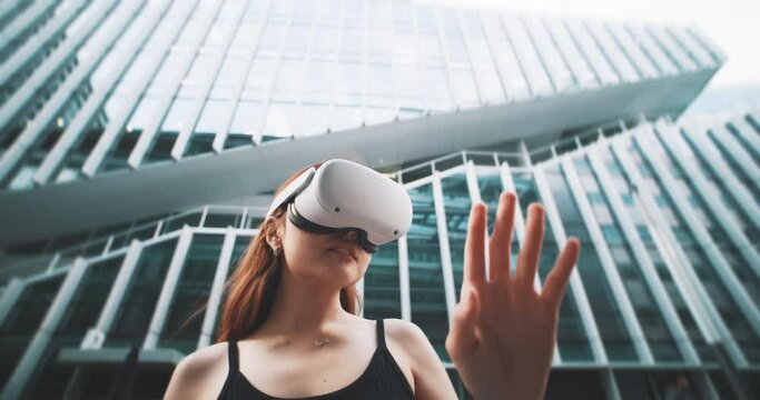Girl experiencing virtual reality in the city