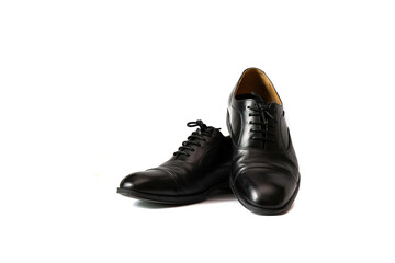 Classic male black lace leather shoes isolated on a white background.
