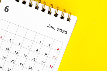 june calendar 2023 on a yellow background. - obrazy, fototapety, plakaty