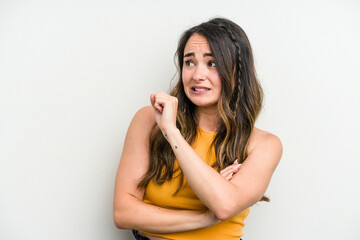 Young caucasian woman isolated on white background confused, feels doubtful and unsure.