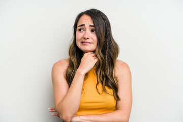 Young caucasian woman isolated on white background suffers pain in throat due a virus or infection.