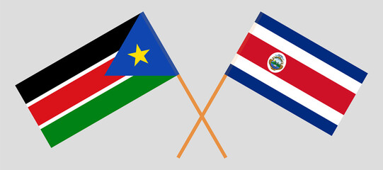 Crossed flags of South Sudan and Costa Rica. Official colors. Correct proportion