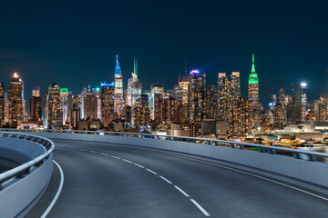 Obraz premium Empty urban asphalt road exterior with city buildings background. New modern highway concrete construction. Concept of way to success. Transportation logistic industry fast delivery. New York. USA.