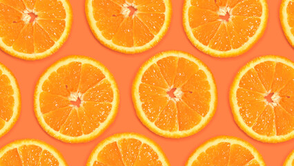 Seamless pattern with orange slices on a warm background. Fruity background, with juicy citrus pieces. Summer background