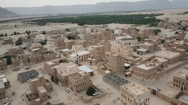 Aerial view of Shibam city and Wadi Sidba, Badra historic district in Yemen.