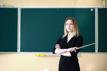 Young teacher in school class