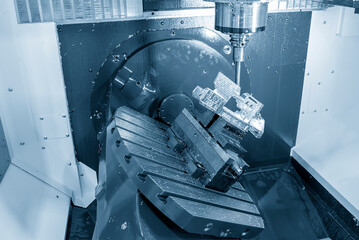 The 5-axis machining center table-tilt type cutting the aero space parts by indexable tool.