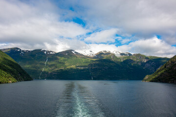 Fototapeta premium Entrance of the Geiranger fjords near Geiranger town from harbor Møre og Romsdal at Geirangerfjorden in Norway (Norwegen, Norge or Noreg)