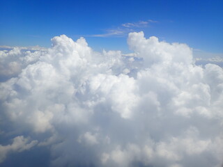 beautiful view over the cloud and blue sky from air plane window	