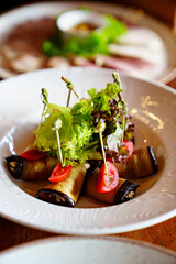 eggplant snack stuffed into rolls. recipes for dishes from vegetables.