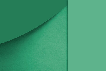 Textured and plain blue green sheet papers forming a curve and vertical blank rectangle for creative cover designing