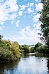 Fototapeta na wymiar Meadowbank Park Lake Dorking Lanscape With Water Reflection Of Trees