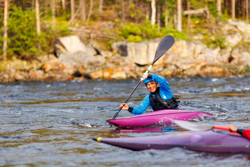 Concept active weekend recreation. Adventure group of friends kayaking on calm river. Back view man on kayak, sunlight