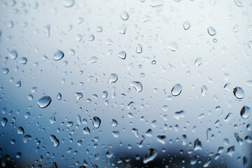 Drops of rain on the glass background