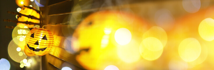 Halloween - Jack O' Lanterns. The concept of light on the night Halloween.Round lamp shape of pumpkin used to decorate with bokeh.