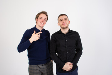Two handsome guys. Young gay couple relaxing at home.	