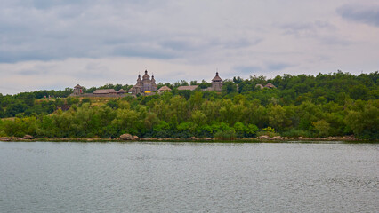 Fototapeta na wymiar View of the wooden church in the National Reserve Zaporizhzhia Sich