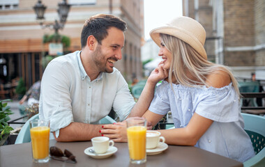 Fototapeta na wymiar Romantic couple in the cafe. Dating, love, relationships