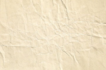 Crumpled brown background paper sheet texture