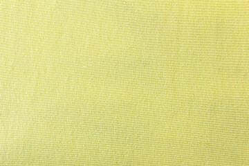 Cotton linen woven fabric texture background in light yellow color. Yellow fabric texture background. Fabric bright ecological canvas Wallpaper with a delicate striped pattern.