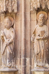 Sculptures of the apostles Pablo and Andrés on the gothic facade of the cathedral of Murcia