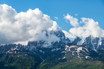 Beautiful mountains landscape. Clouds covering the top of Ushba mountain.  Svaneti Geogria
