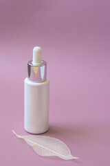 packaging for cosmetics on a pink background