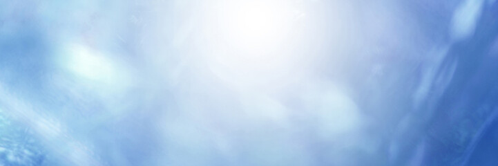 Light blue Leaf background. Blurred leaves and circular bokeh. Abstract wallpaper for backdrop and design